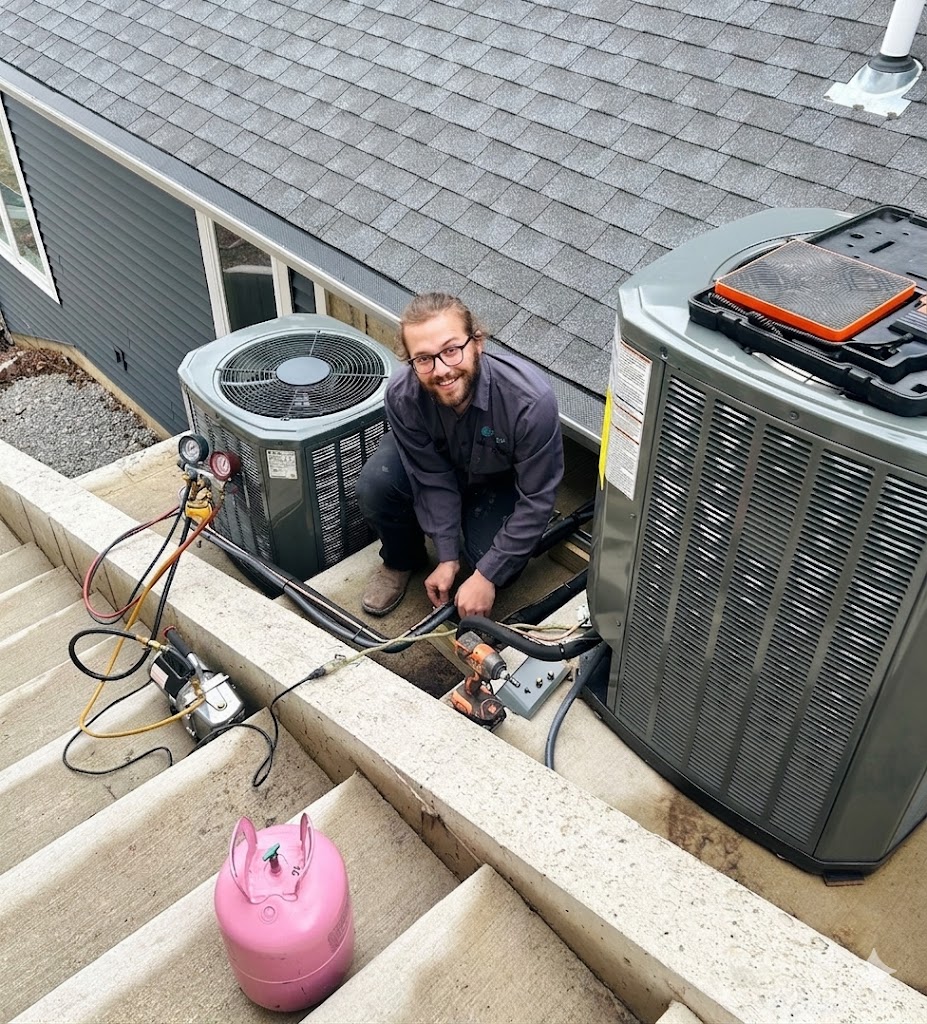 Technician working on AC